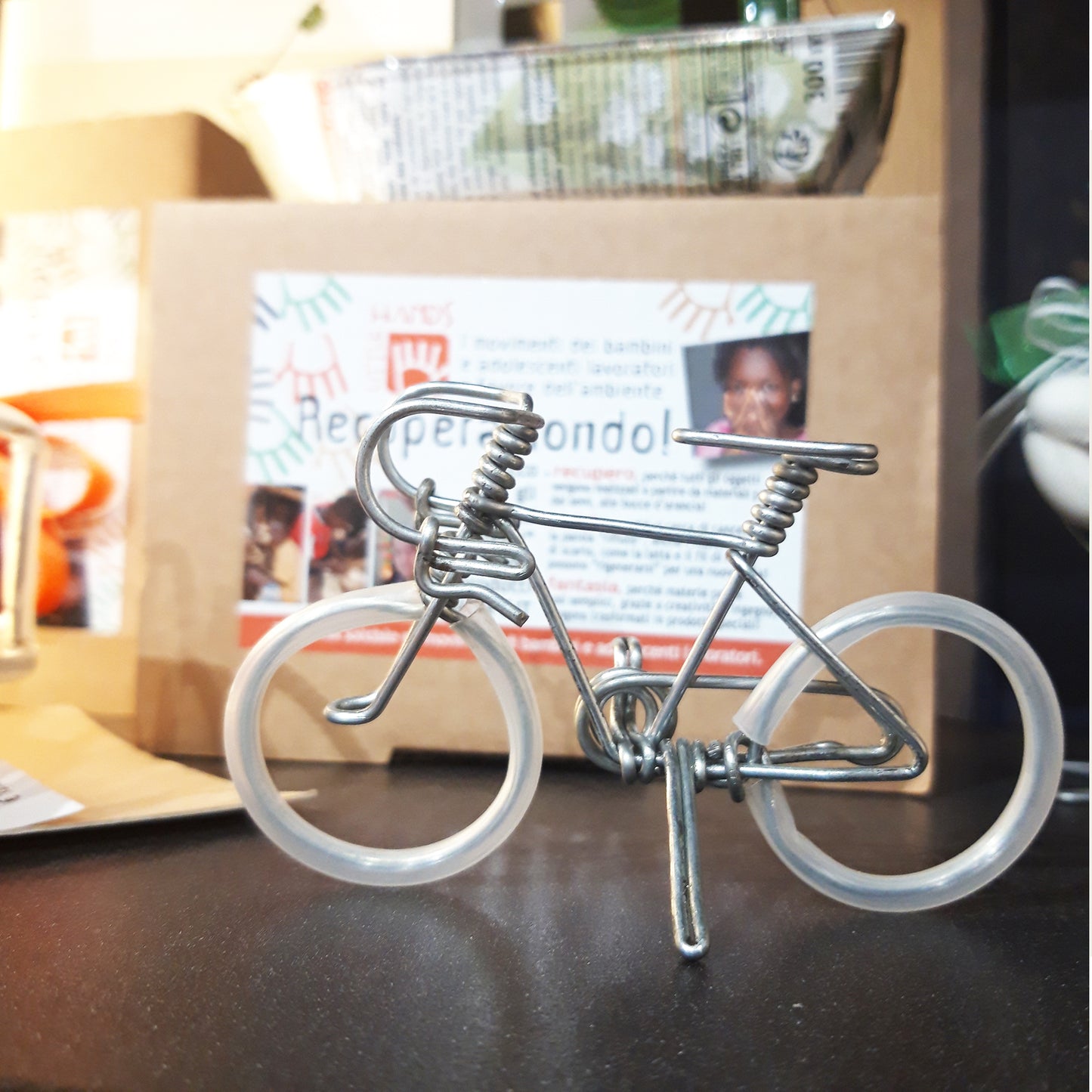 bomboniera-solidale-bicicletta-little-hands-per comunione e cresima