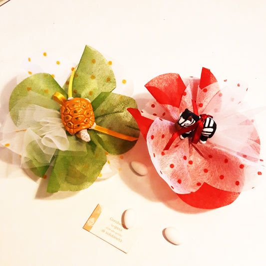 bomboniera solidale con animaletti vari in terracotta per battesimo e comunione