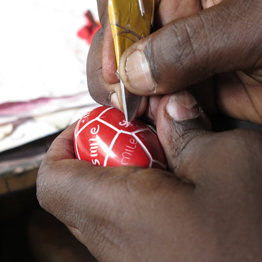 BOMBONIERA PESCIOLINO ROSSO PORTAFOTO IN PIETRA SAPONARIA | COD L09